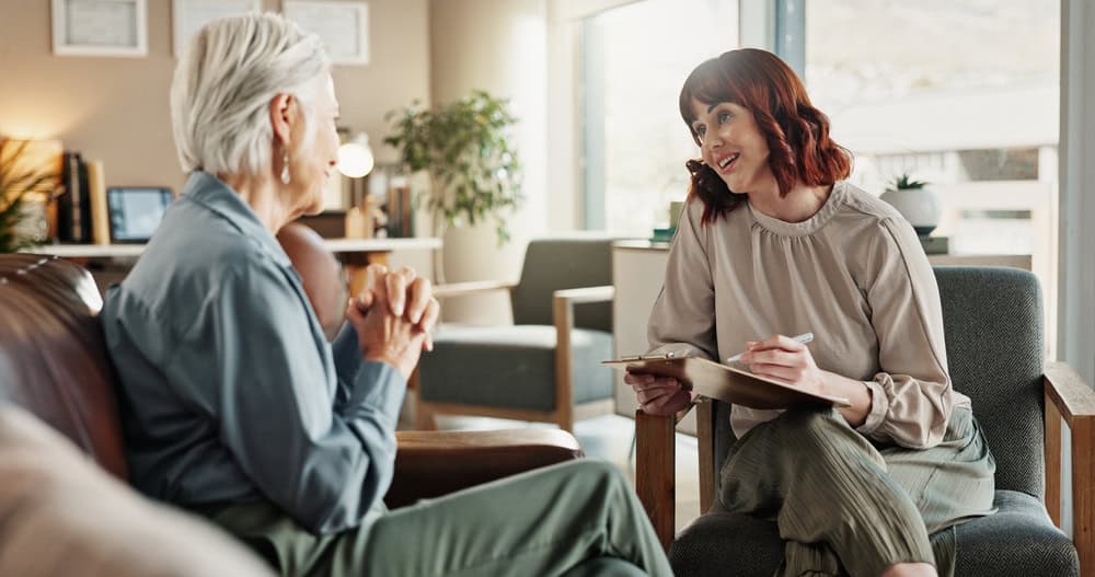A person talking with a counselor
