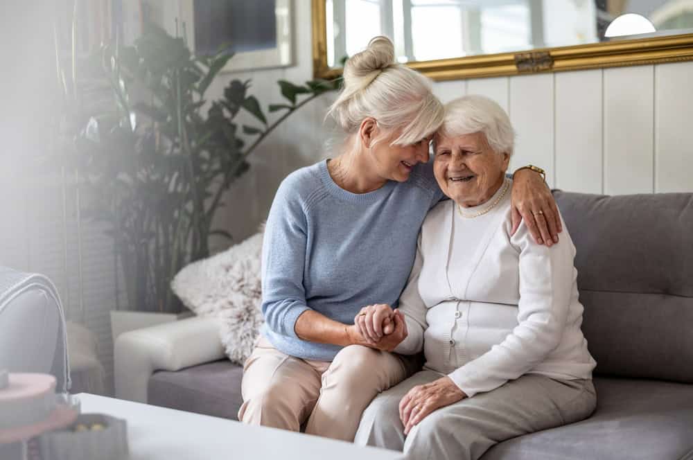 A woman embracing her mother