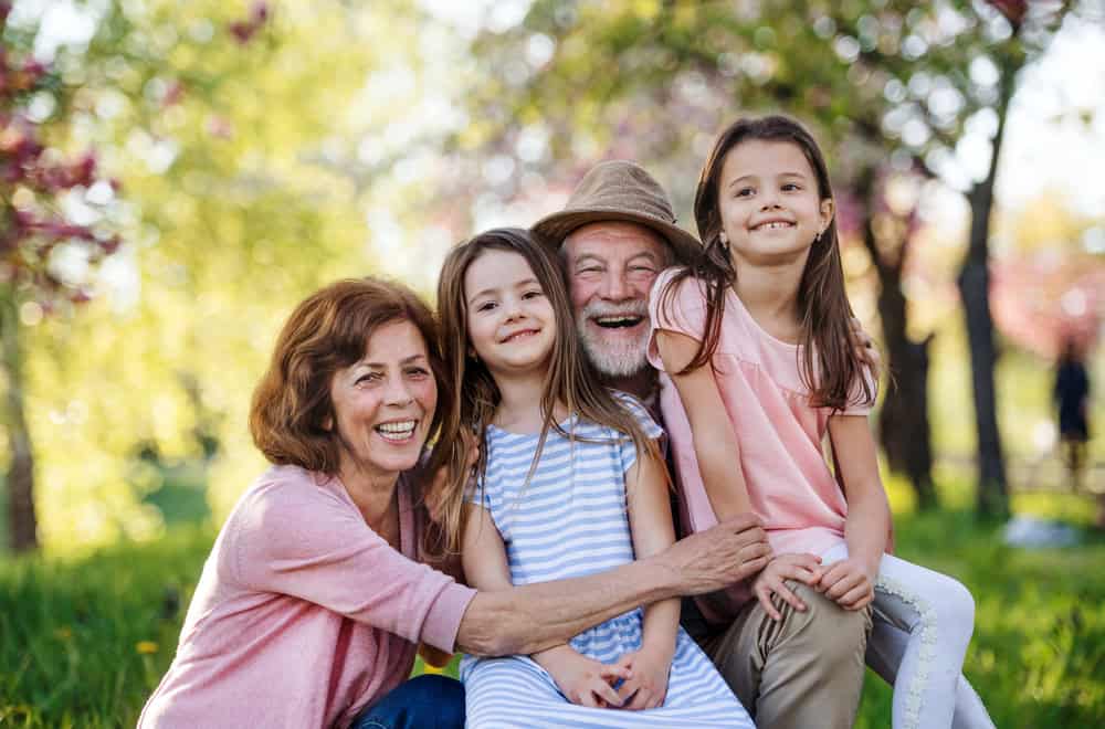A joyful family moment at Belmont Village senior living community.