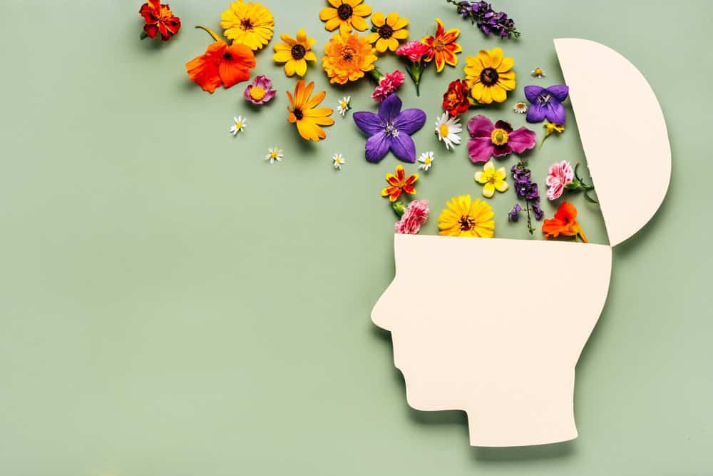 Senior living community with vibrant floral decor and engaging activities.