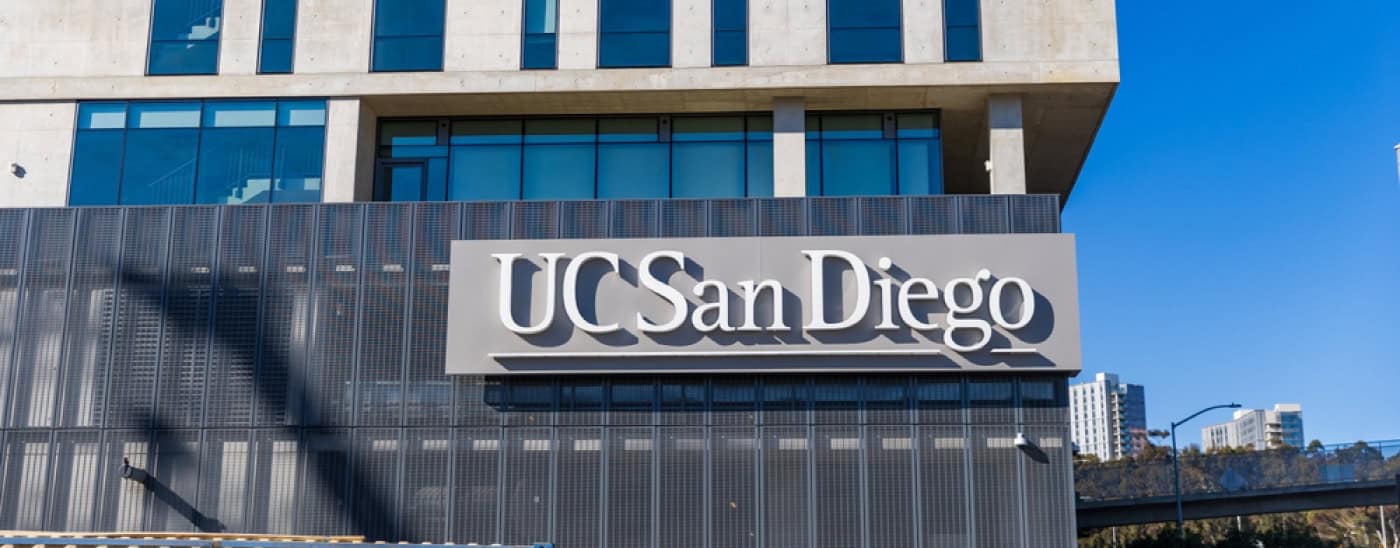A side of a building with the a sign for UC San Diego