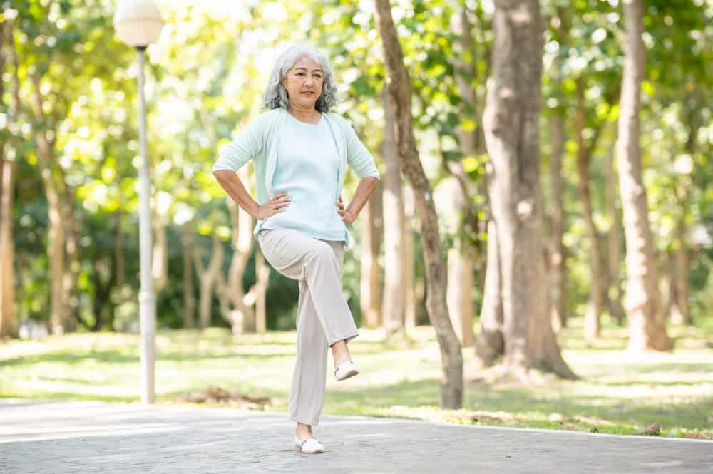 A woman shown exercising