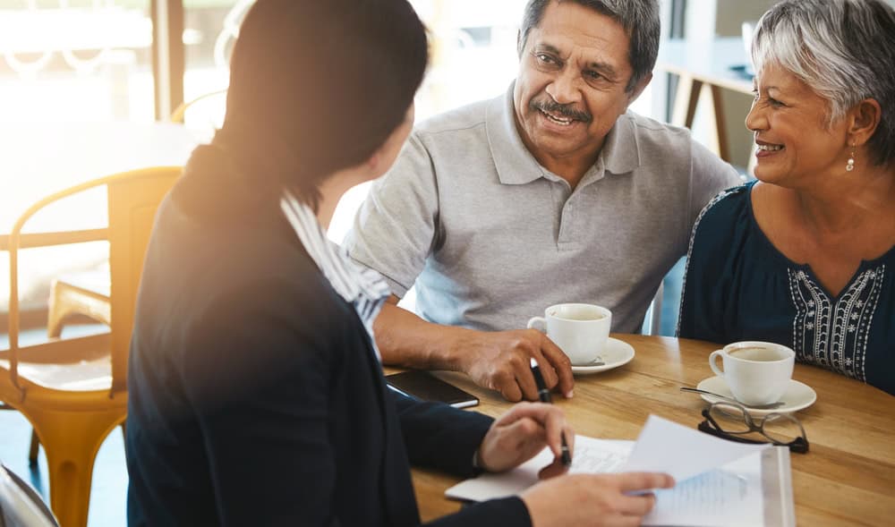 A couple consulting with an advisor