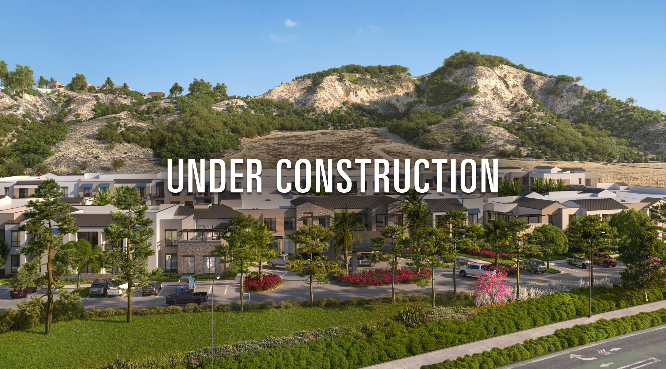A rendering of BELMONT VILLAGE SENIOR LIVING AT Encinitas, featuring mountains and blue sky in the background