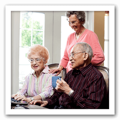 blog portrait of seniors on computer